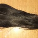 12 inches long 2.5 inches thick light brown more of black hair virgin hair straight silky and shiny