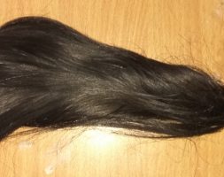 12 inches long 2.5 inches thick light brown more of black hair virgin hair straight silky and shiny