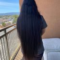 28 inches of black shiny lustrous and voluminous hair