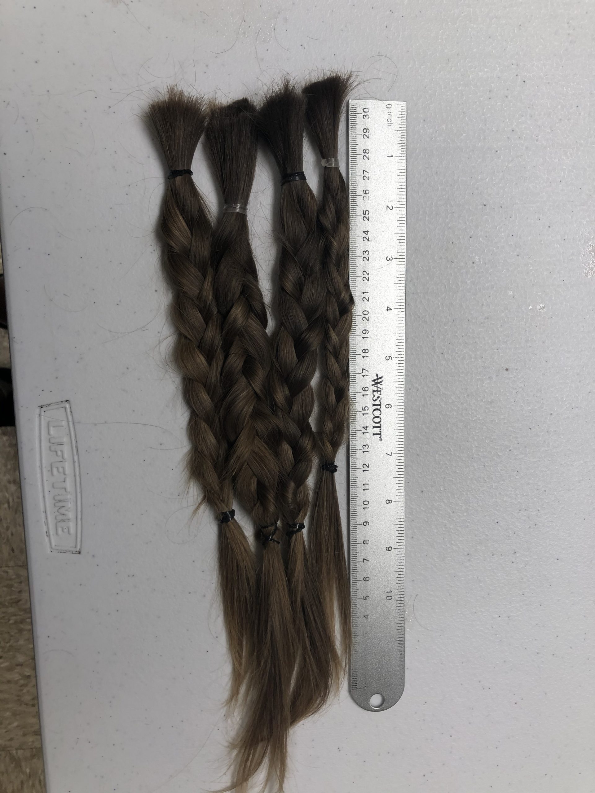 14-15 inches of blonde virgin hair